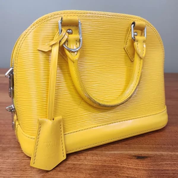 Louis Vuitton Alma Yellow Epi Leather Handbag, side view