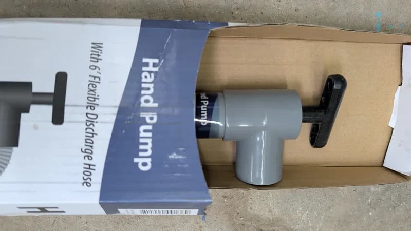 Hand Pump with 5 ft Flexible Discharge Hose, side view