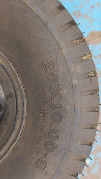 All-Terrain Pneumatic Tires w/ Wheel Rims, rear view