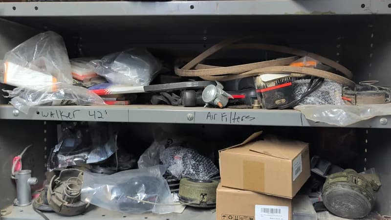 Lawn Equipment Parts & Accessories Lot with Metal Shelf - Cabinet not included, side view