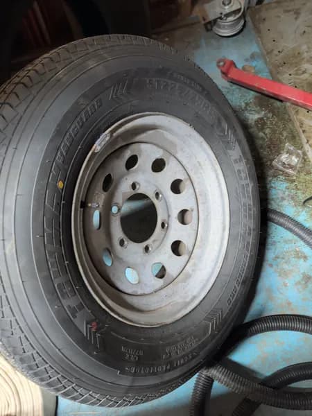 Lot of 2 vehicle tires, side view