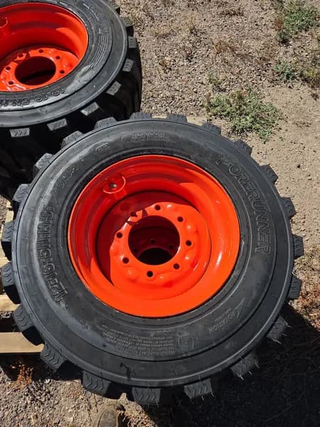 Set of 4 new wheels and tires for Bobcat/Kubota 12-16.5 N.H.S. SKS-1, side view