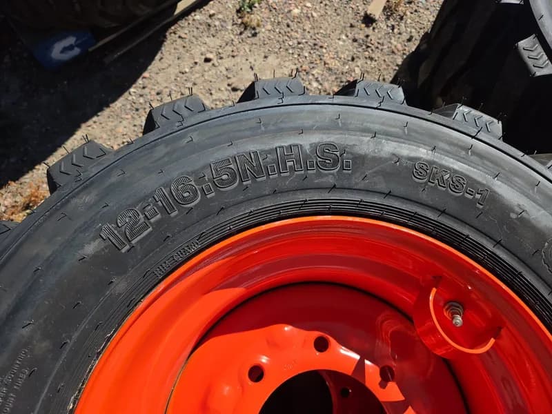 Set of 4 new wheels and tires for Bobcat/Kubota 12-16.5 N.H.S. SKS-1, rear view