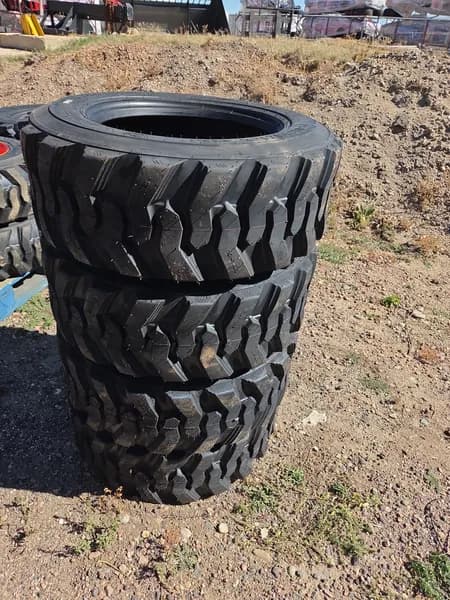 Set of 4 New Skid Steer Tires 10-16.5 SKS-1, primary view