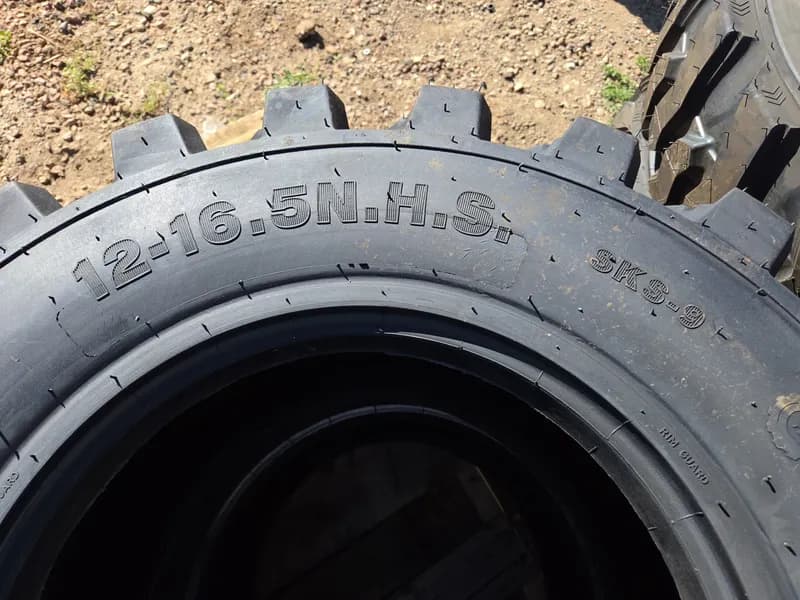 New Set of Four Forerunner SKS-9 Skid Steer Tires - Size 12-16.5, rear view