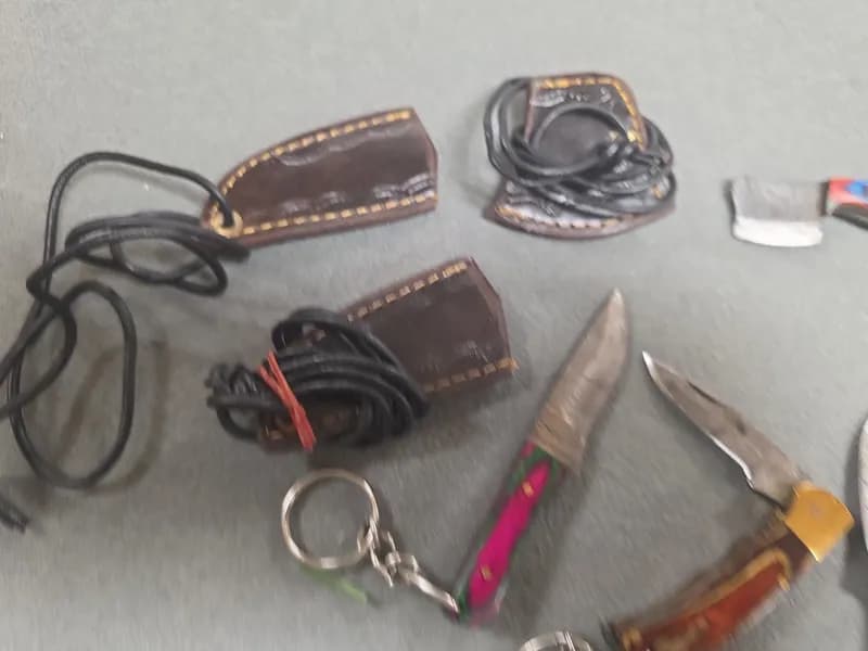 Lot of 6 Miniature Damascus-Pattern Style Keychain Knives & 3 Sheaths, close-up view