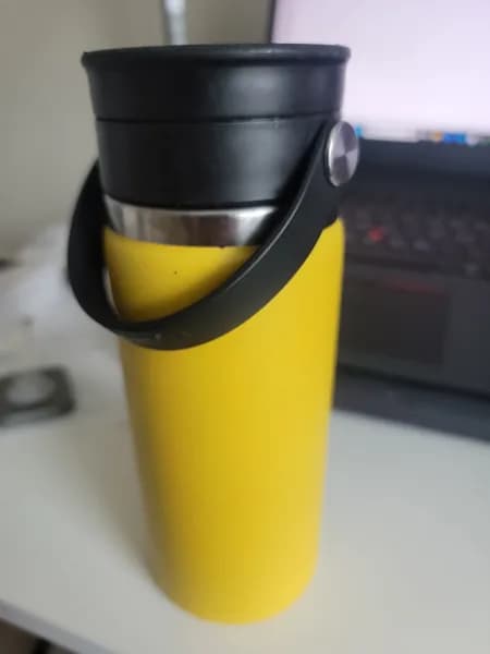 Hydro Flask Wide Mouth Flex Sip Lid Black with Yellow Insulated Bottle, side view