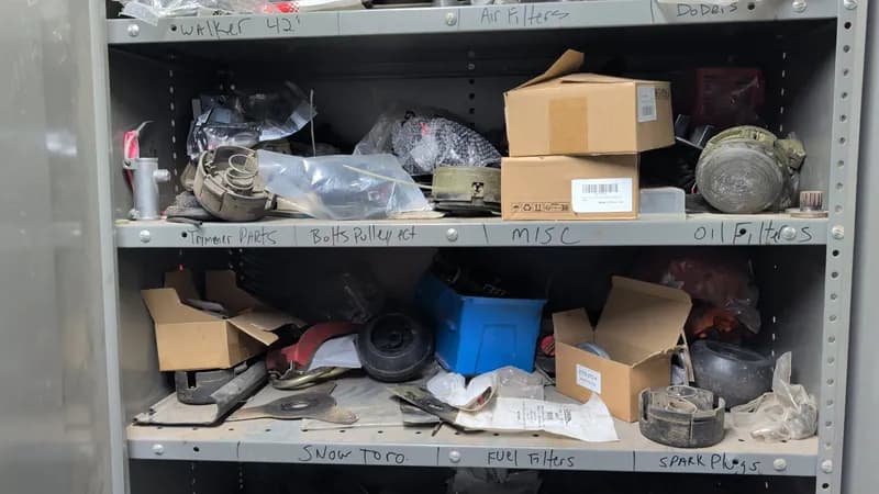 Lawn Equipment Parts & Accessories Lot with Metal Shelf - Cabinet not included, detail view