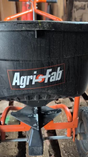 Agri-Fab Broadcast Spreader Orange & Black, side view